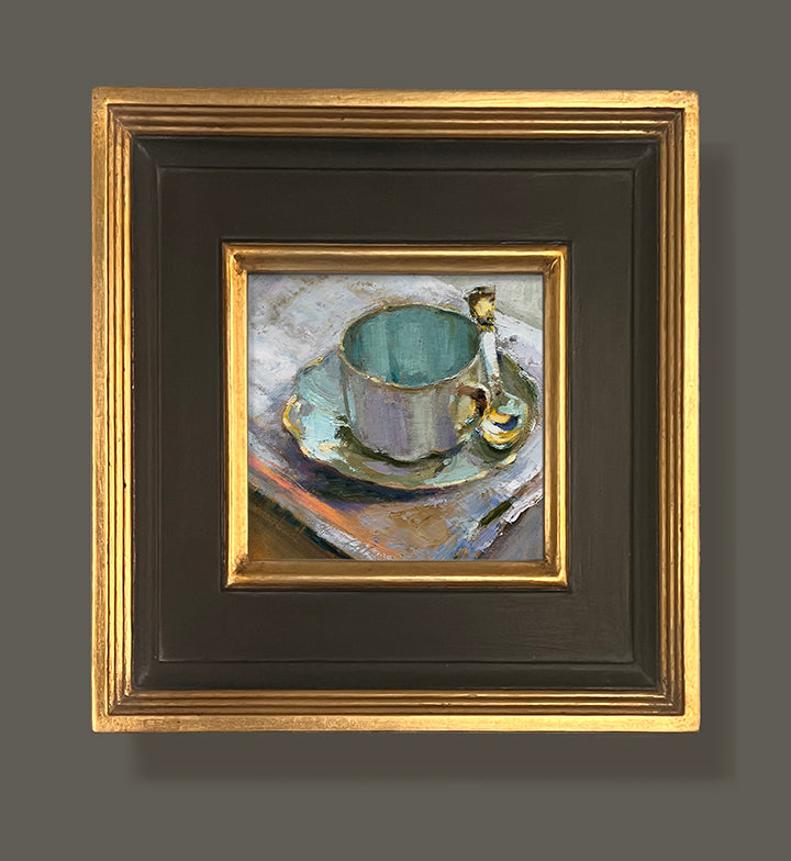 A Favorite framed oil painting featuring a mug and saucer. By artist Jennifer Hansen Rolli.