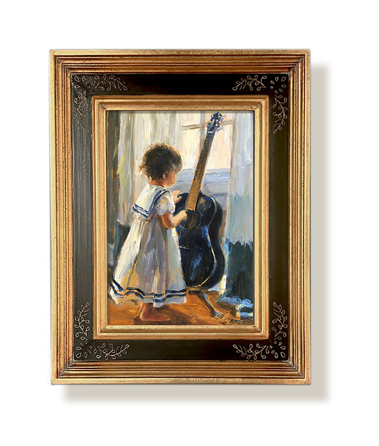 In Tune gold framed oil painting featuring a little girl standing with a guitar. By artist Jennifer Hansen Rolli.