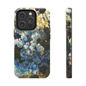 Iphone 14 pro case with blue floral painting.