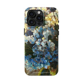 Iphone 15 pro max phone case featuring a blue hydrangea flower painting.