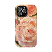 iPhone 16 case featuring a pink peony painting by artist Jennifer Hansen Rolli.
