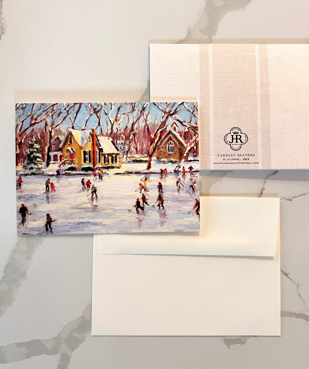 Card with a winter scene of people skating on a pond, featuring a snowy village and trees.