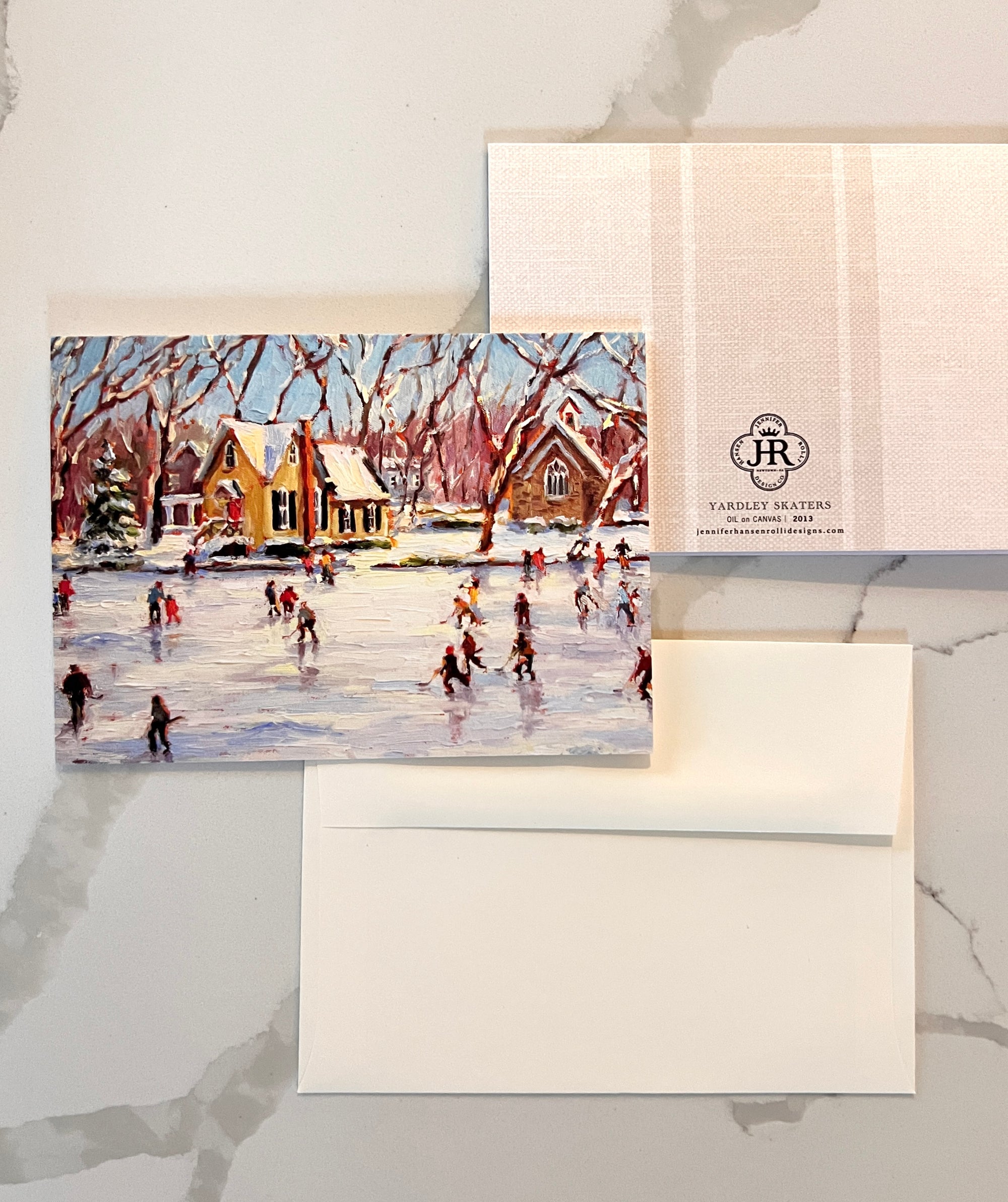 Card with a winter scene of people skating on a pond, featuring a snowy village and trees.