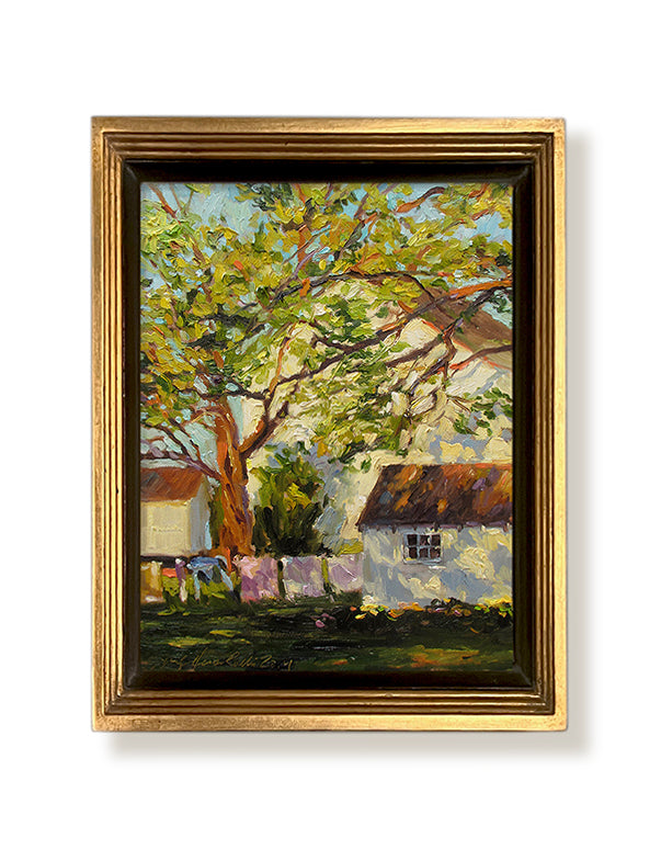 Moving Air gold framed oil painting featuring a house and trees. By artist Jennifer Hansen Rolli.