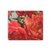 A mousepad featuring the red peony artwork of artist Jennifer Hansen Rolli.