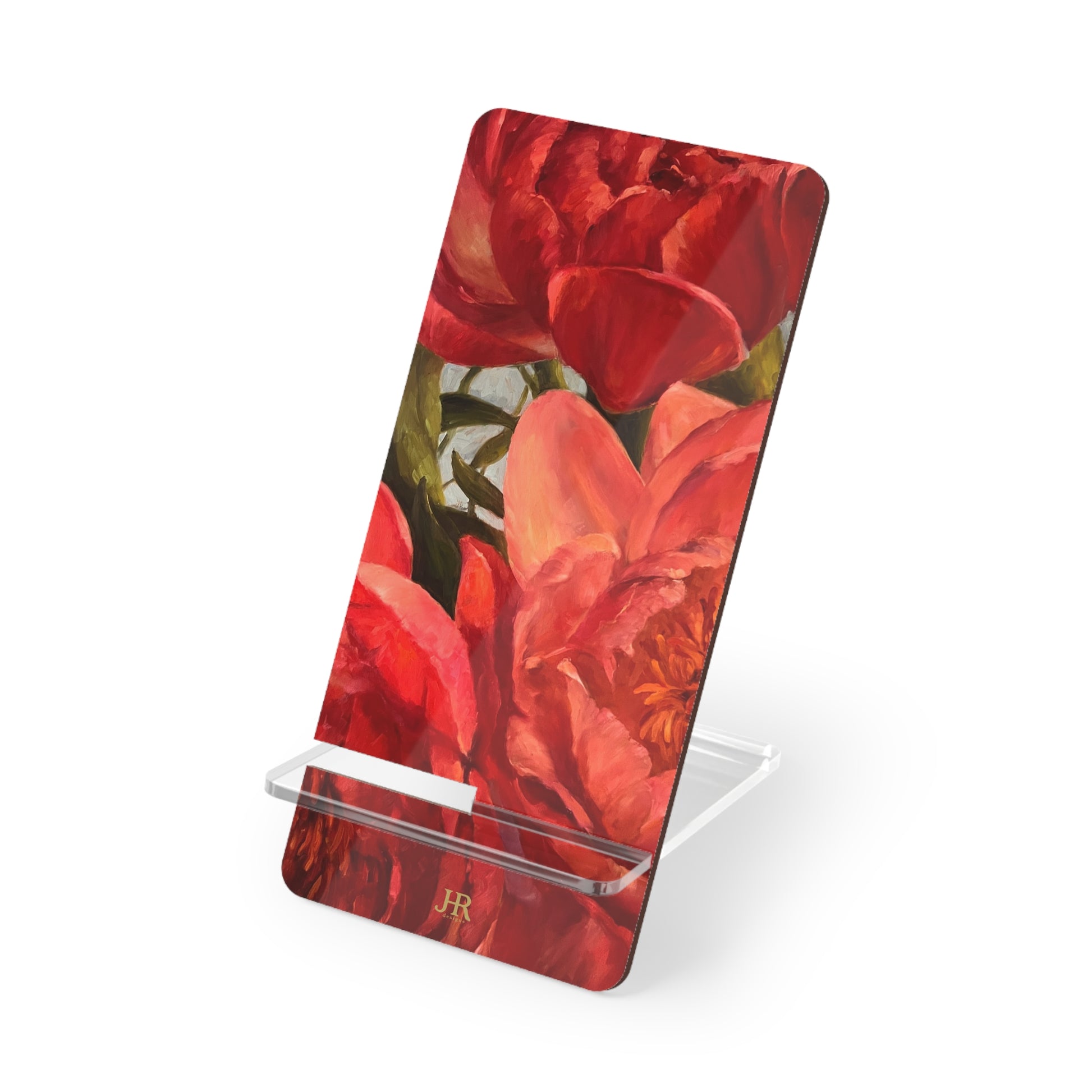 A red peony phone stand by artist Jennifer Hansen Rolli.